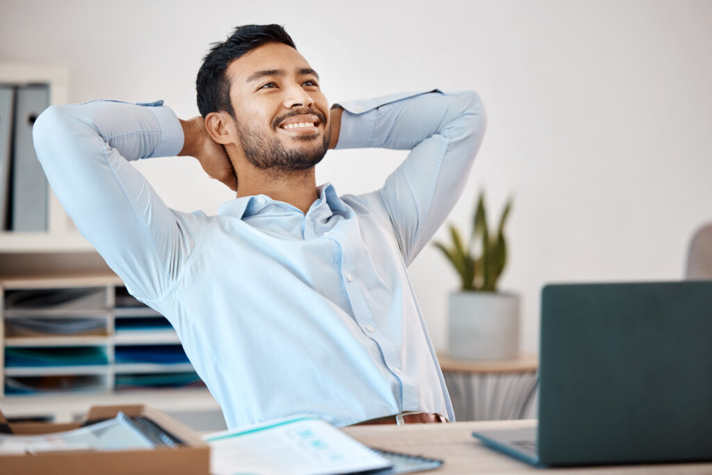 A man relaxing while working